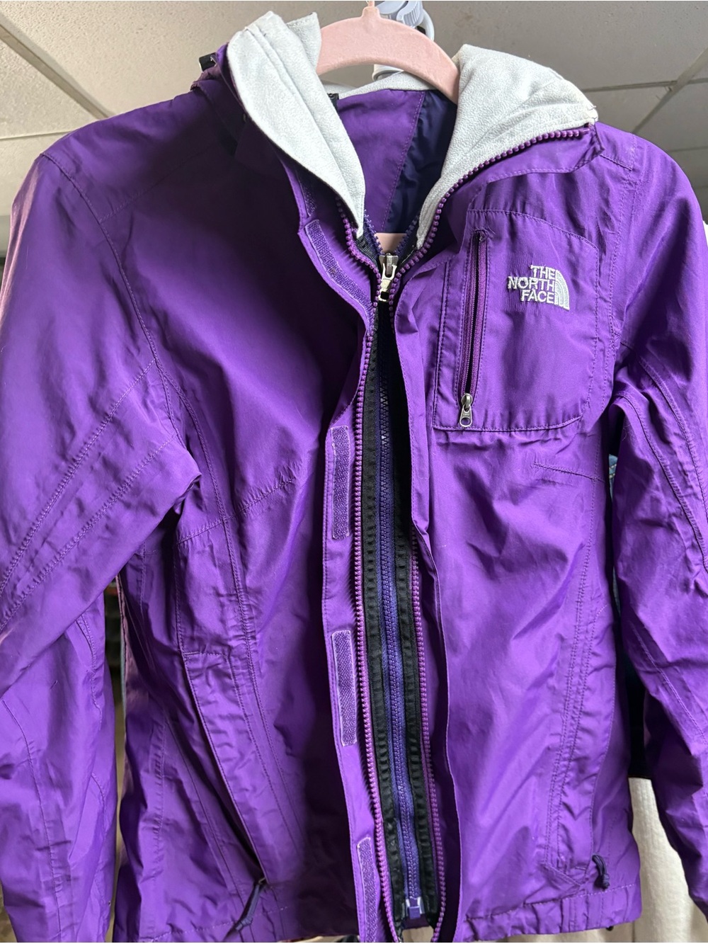 The North Face Purple Hooded Rain Jacket with Gray Lining